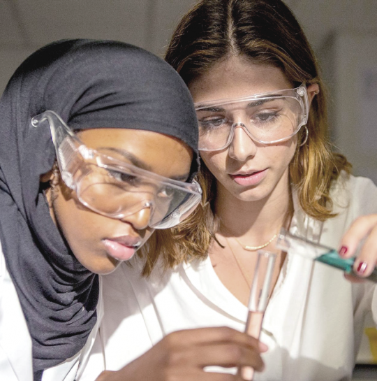 Two-girls-in-science-class